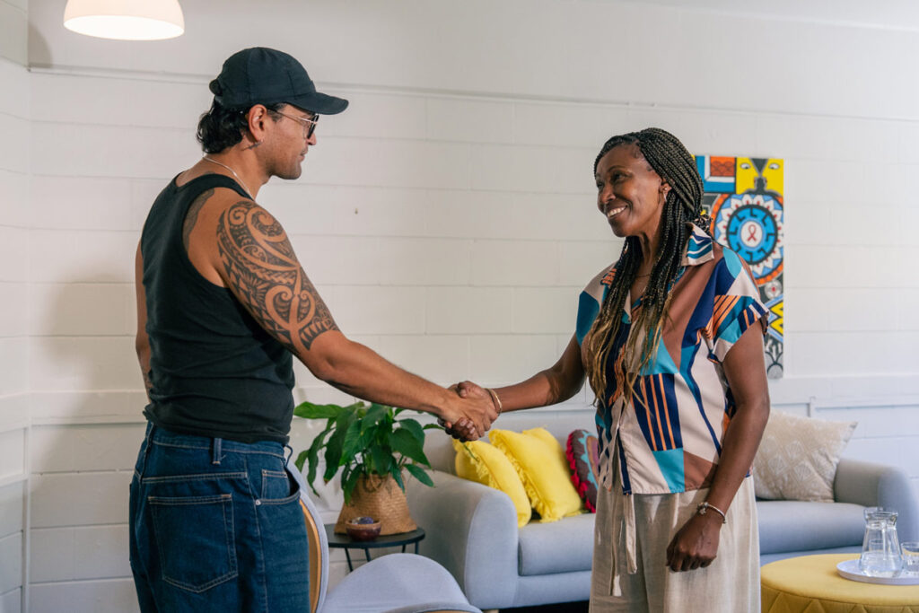 Two people shaking hands when meeting each other